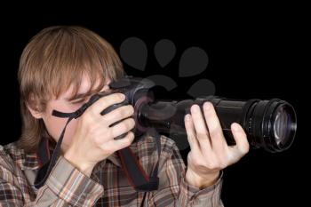 Royalty Free Photo of a Photographer With a Zoom Lens