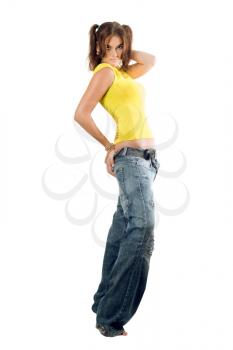 Royalty Free Photo of a Young Woman in Jeans and a Tank Top