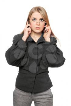 Royalty Free Photo of a Woman With Two Phones