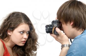 Royalty Free Photo of a Man Taking a Picture of a Girl