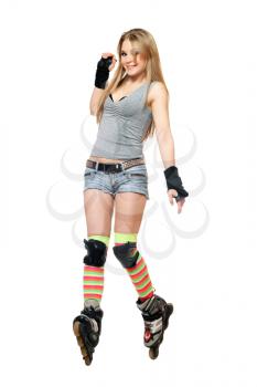 Royalty Free Photo of a Young Woman on Roller Skates