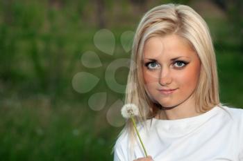 Royalty Free Photo of a Young Woman With a Dandelions