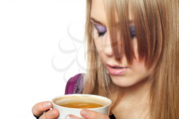 Royalty Free Photo of a Young Woman Having Tea