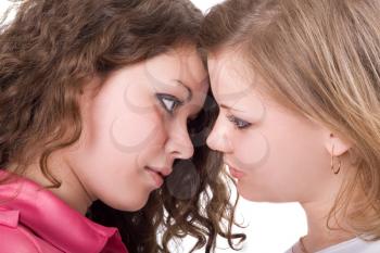 Royalty Free Photo of Two Young Women Face to Face