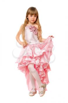Little girl in a chic pink dress. Isolated