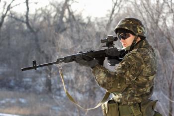Soldier with a sniper rifle in his hands