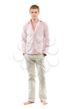 Young man in pants and shirt. Isolated on white