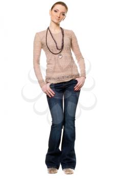 Young woman in a jeans and blouse. Isolated on white