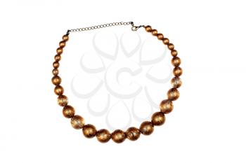 Large gold necklace on a white background