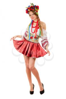 Sexy young woman in the Ukrainian national clothes. Isolated