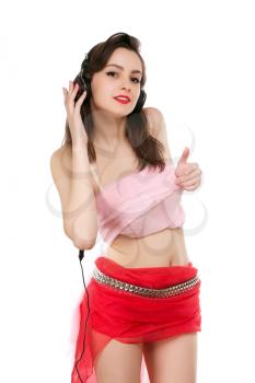 Beautiful young brunette posing with black headphones. Isolated on white 