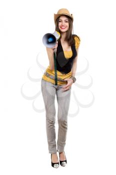 Smiling brunette with a loudspeaker wearing grey jeans and stetson. Isolated on white