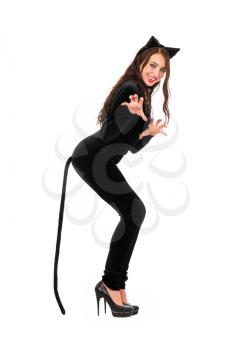 Young joyful woman dressed in black catsuit. Isolated on white
