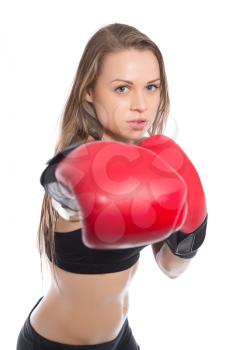 Portrait of young woman boxing. Isolated on white