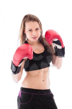 Charming blond woman posing with boxing gloves. Isolated on white