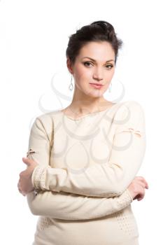 Portrait of nice brunette posing in white dress. Isolated