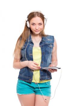 Portrait of young blond woman in headphones. Isolated on white