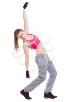 Sexy sporty woman doing exercises. Isolated on white