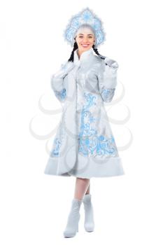 Smiling brunette wearing blue costume of snow maiden. Isolated on white
