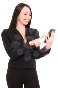 Portrait of smiling businesswoman with smartphone. Isolated on white