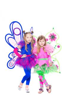 Two beautiful little girls dressed in blue and pink butterfly suit. Isolated on white