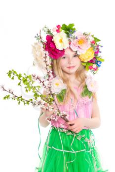 Portrait of little girl with flowering branches. Isolated on white