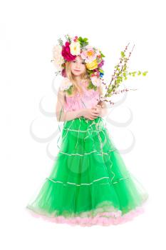 Little girl in wreath on her head posing with flowering branches. Isolated