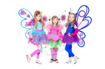 Three beautiful little girls posing in butterfly dress. Isolated on white