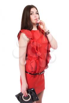 Portrait of brunette posing in red dress. Isolated on white