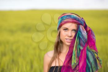 Portrait of pretty woman wearing colorful pareo