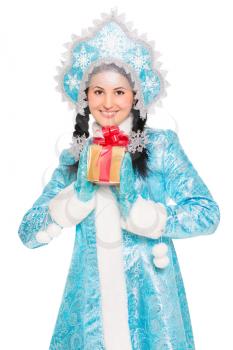Young brunette in a suit of snow maiden with gift. Isolated