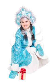 Young joyful woman posing in winter costume. Isolated on white