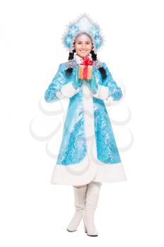 Beautiful woman in winter costume posing with gift. Isolated on white