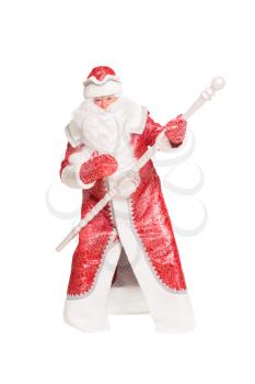 Santa Claus playing with a staff. Isolated on white