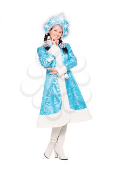 Cheerful brunette posing in winter traditional costume. Isolated on white