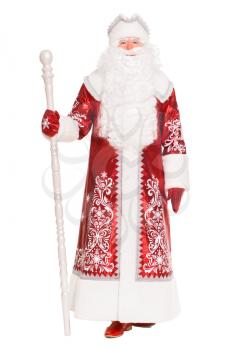 Santa Claus wearing red coat with a staff. Isolated on white