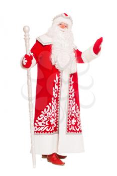 Santa Claus posing with a staff. Isolated on white