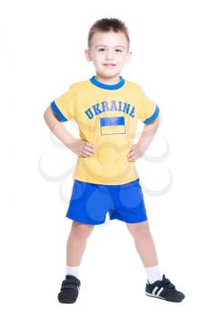 Nice little boy wearing Ukrainian football uniform. Isolated on white