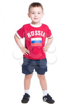 Nice little boy wearing Russian football uniform. Isolated on white