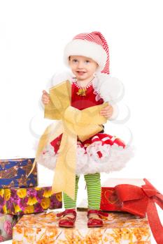 Happy little girl wearing in Santa's helper costume. Isolated on white