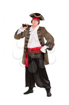 Man posing in pirate costume with a pistol. Isolated on white
