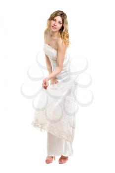 Pretty young blonde wearing white dress and pink shoes. Isolated
