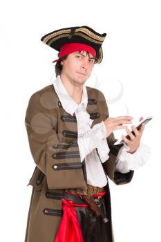 Young man in medieval costume posing with a tablet. Isolated on white
