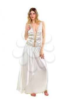 Seductive blonde wearing white evening dress and pink shoes. Isolated