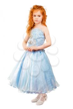 Little redhead girl wearing princes blue dress. Isolated on white