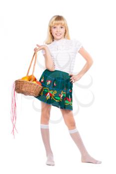 Attractive blond girl posing with basket. Isolated on white
