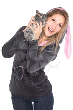 Portrait of cheerful blond woman with chinchilla. Isolated on white