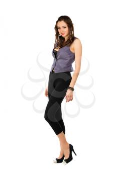 Young alluring lady posing in tight black leggings. Isolated on white