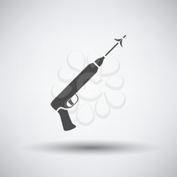 Fishing icon with speargun over gray background. Vector illustration.