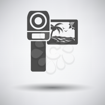 Video camera icon on gray background with round shadow. Vector illustration.